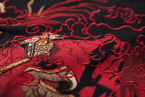 Camiseta bordada de Guerra de Dragones
