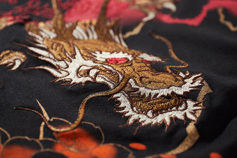 Camiseta bordada de Guerra de Dragones