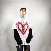 Camiseta de manga larga con corazón roto